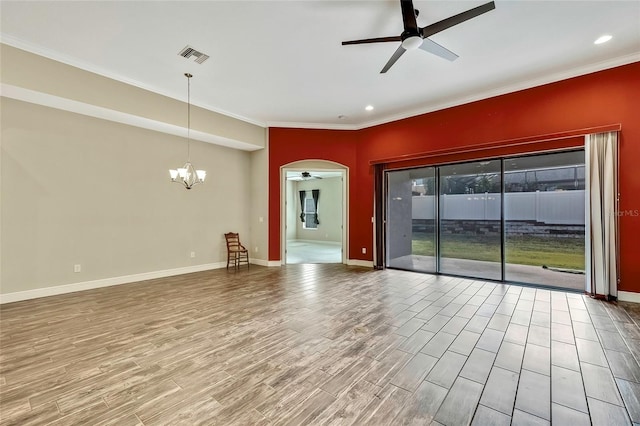 unfurnished living room with ornamental molding, ceiling fan with notable chandelier, and hardwood / wood-style flooring