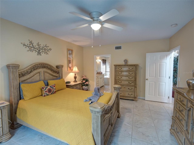 bedroom featuring ceiling fan and ensuite bath