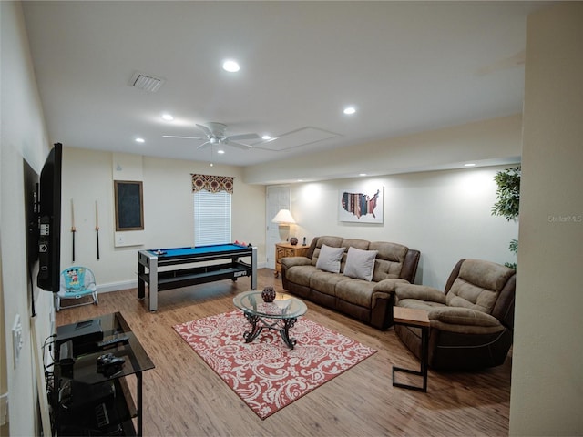 living room with ceiling fan, hardwood / wood-style flooring, and pool table