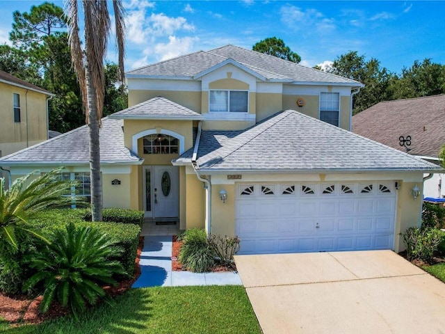 view of property featuring a garage