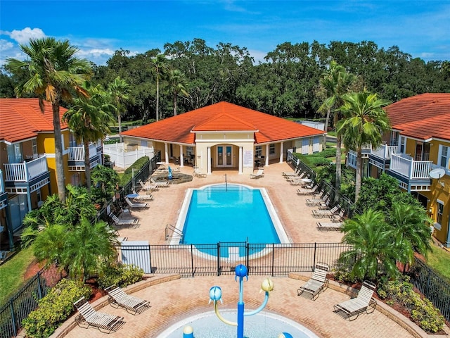 view of swimming pool with a patio