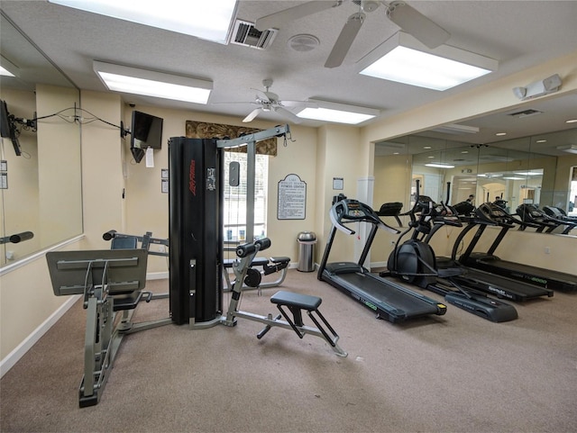 gym with ceiling fan