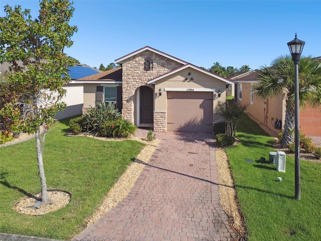 single story home with a front lawn and a garage