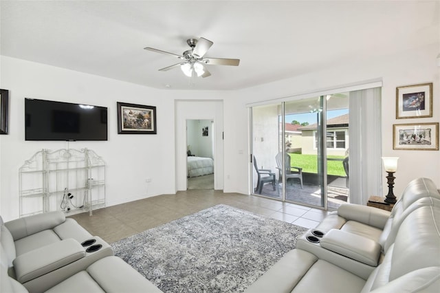 tiled living room featuring ceiling fan