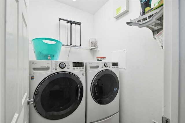 laundry room with washer and dryer