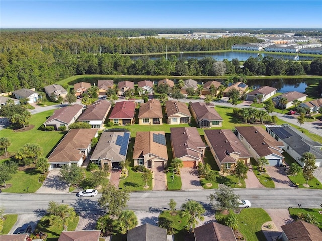 drone / aerial view with a water view