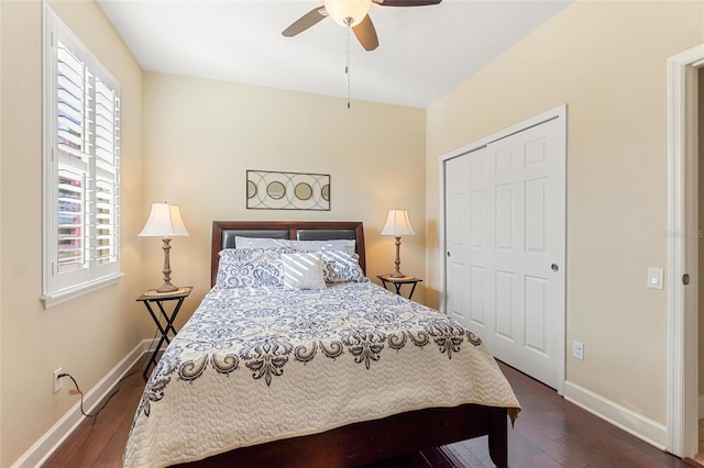341 Navarra Ln, Davenport, FL 33837 - bedroom with a closet, baseboards, a ceiling fan, and dark wood finished floors