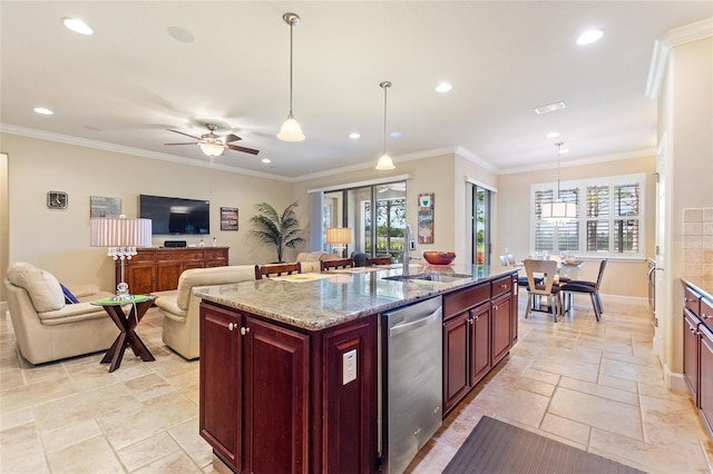 kitchen with ceiling fan, dishwasher, decorative light fixtures, and sink