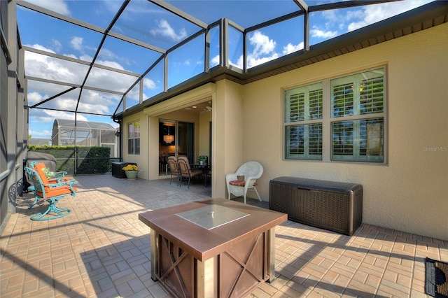 341 Navarra Ln, Davenport, FL 33837 - view of patio / terrace featuring outdoor dining space, ceiling fan, and a lanai