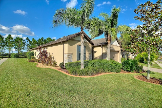 view of side of property with a yard