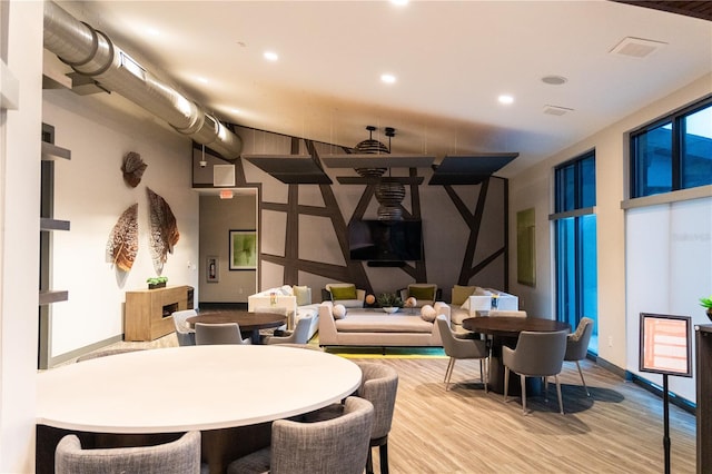 dining space featuring light hardwood / wood-style floors