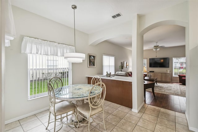 dining room featuring light hardwood / wood-style floors and ceiling fan