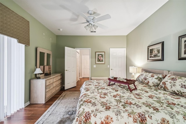 bedroom featuring dark hardwood / wood-style floors and ceiling fan