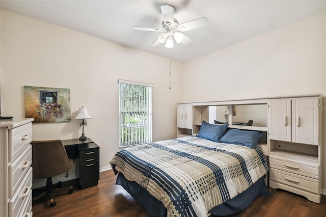 bedroom with dark hardwood / wood-style floors and ceiling fan