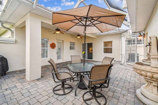 view of patio with ceiling fan