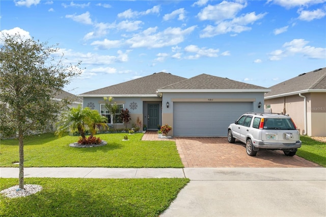 single story home featuring a front yard and a garage