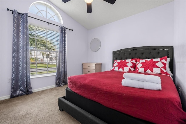 carpeted bedroom with lofted ceiling and ceiling fan