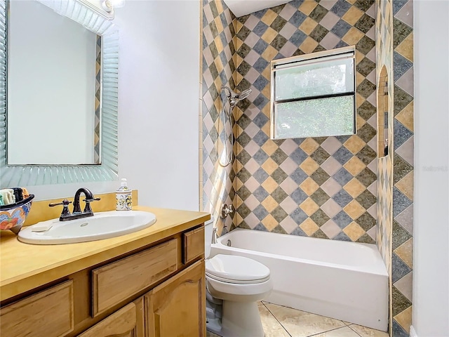 full bathroom featuring shower / bathing tub combination, tile patterned flooring, vanity, and toilet