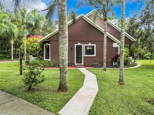 view of front of home with a front lawn