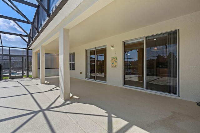 view of patio / terrace with glass enclosure