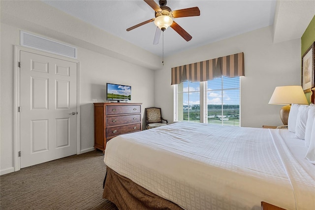 carpeted bedroom with ceiling fan