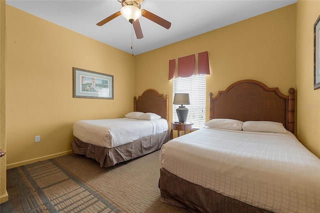 bedroom with ceiling fan and carpet