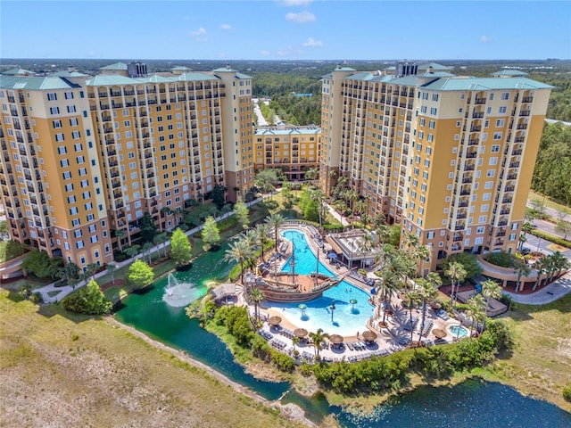 birds eye view of property with a water view