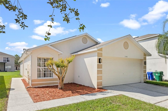 ranch-style house featuring a garage