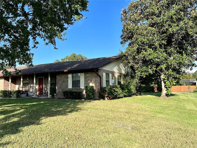 ranch-style house with a front yard