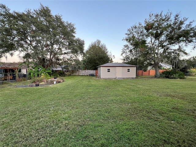 yard at dusk with a shed