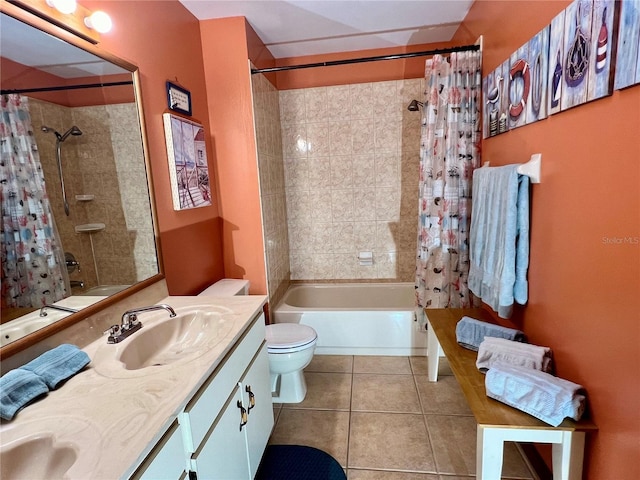 full bathroom with vanity, toilet, tile patterned floors, and shower / bathtub combination with curtain