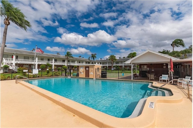 view of swimming pool featuring a patio area