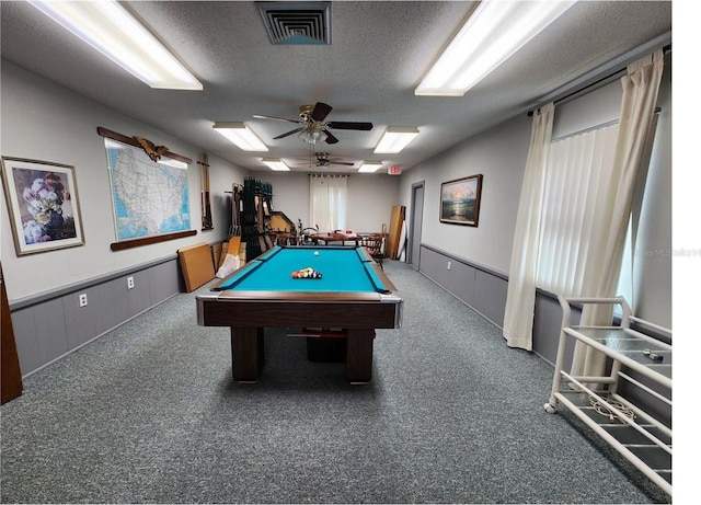 game room with ceiling fan, a textured ceiling, and pool table