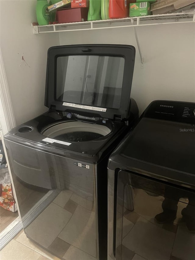 laundry room with tile patterned flooring