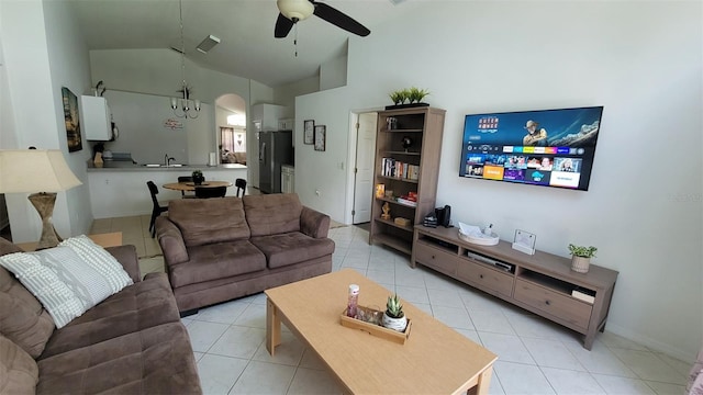 living room with sink, ceiling fan, high vaulted ceiling, and light tile patterned floors