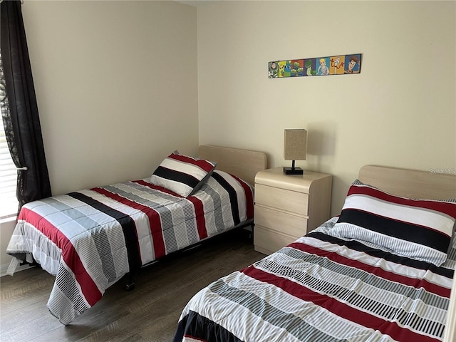 bedroom featuring dark hardwood / wood-style floors