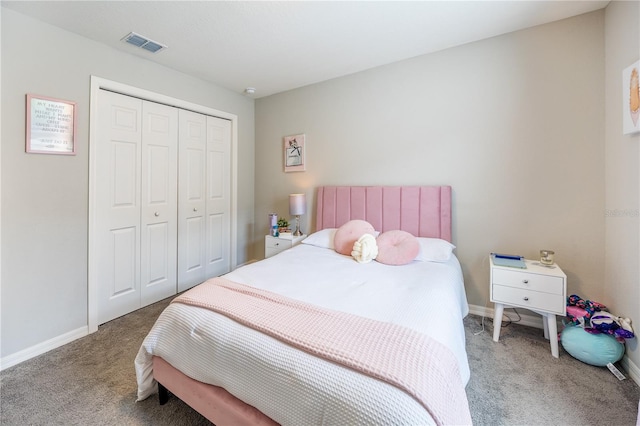 bedroom featuring a closet and carpet