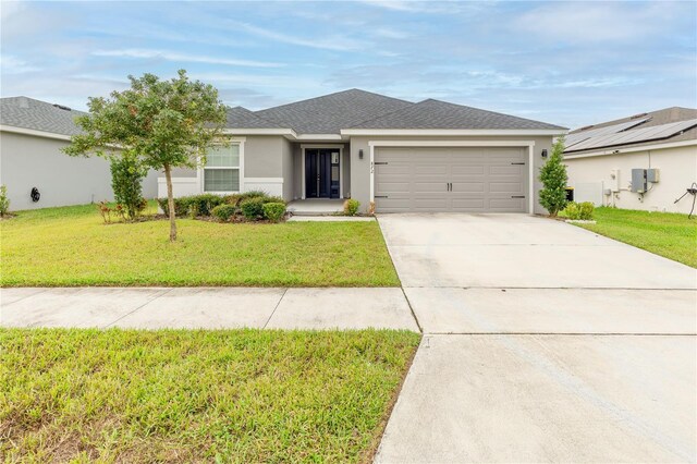 872 Sydney St, Davenport, FL 33837 - single story home with an attached garage, stucco siding, concrete driveway, and a front yard