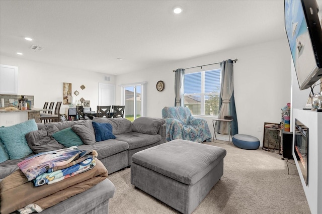 living room with light colored carpet