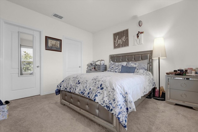 carpeted bedroom with a closet