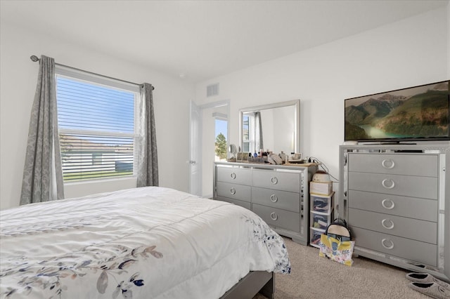 bedroom featuring carpet