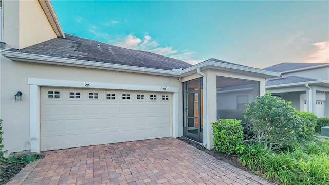 view of front of home with a garage