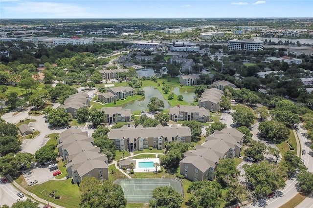 bird's eye view with a water view