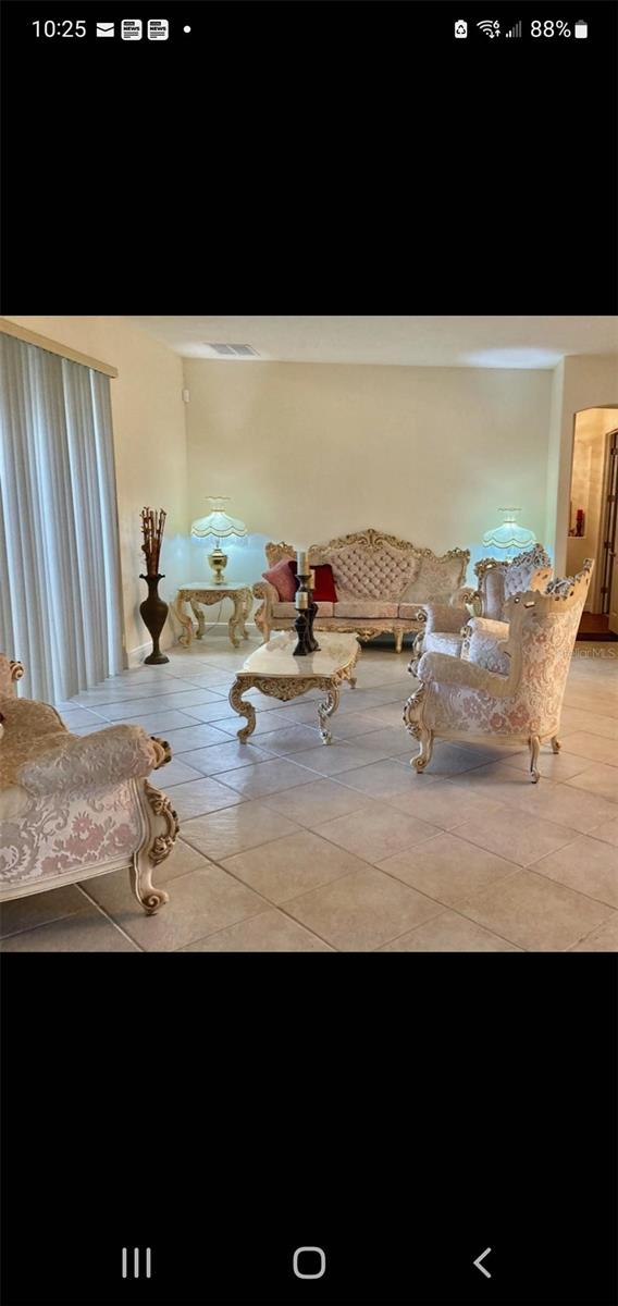 interior space featuring light tile patterned flooring