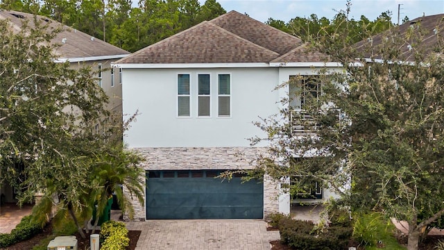 view of front of property featuring a garage