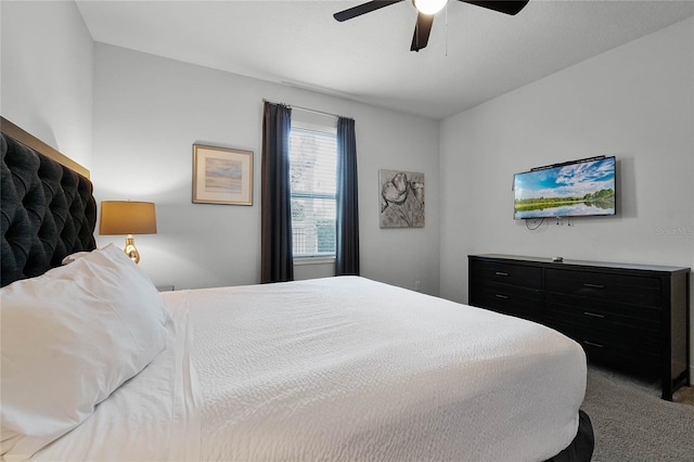 bedroom with ceiling fan and carpet flooring