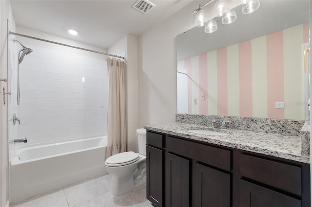 full bathroom with shower / bath combination with curtain, tile patterned floors, vanity, and toilet