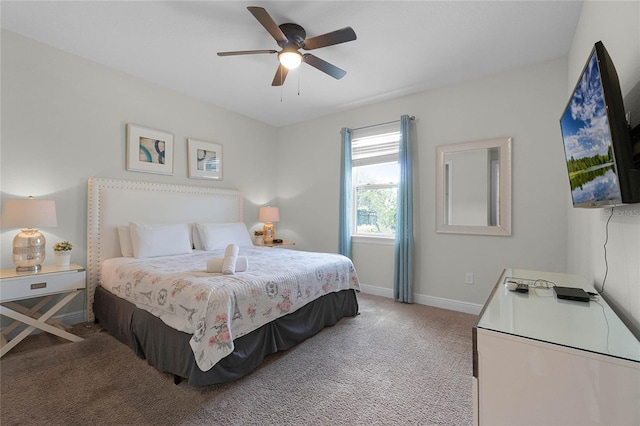 bedroom featuring ceiling fan and light colored carpet