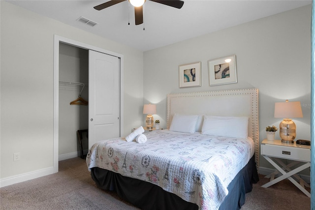 carpeted bedroom with ceiling fan and a closet