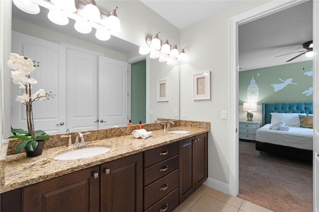 bathroom featuring ceiling fan, vanity, and tile patterned floors